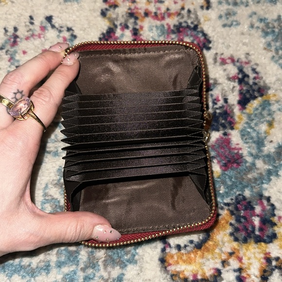 Deep red embossed with imprint detailing accordion zip around wallet - Picture 4 of 4